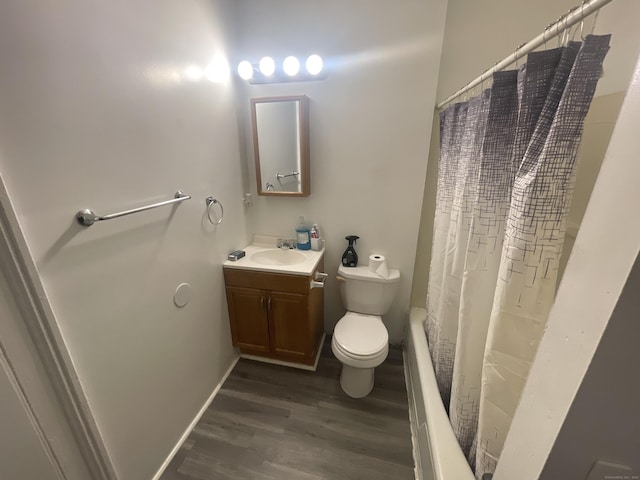 50 Beacon St, Waterbury, CT 06704 - bathroom with vanity, wood finished floors, and shower / bathtub combination with curtain