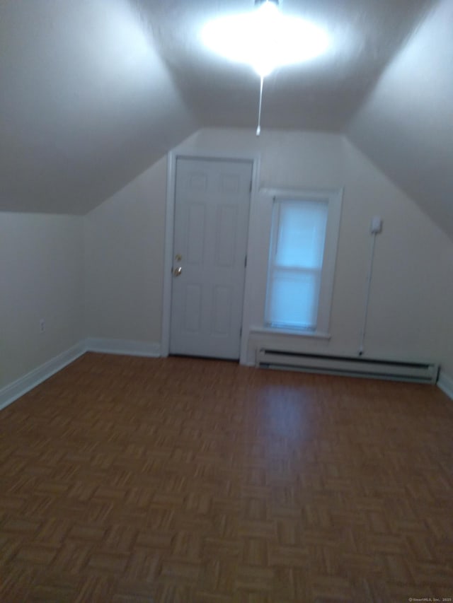 50 Beacon St, Waterbury, CT 06704 - additional living space featuring a baseboard heating unit and lofted ceiling