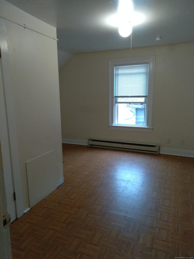 50 Beacon St, Waterbury, CT 06704 - unfurnished room with a baseboard radiator and vaulted ceiling
