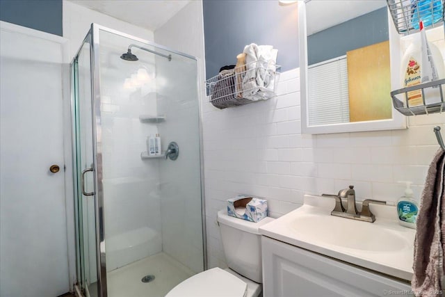115 Sunburst Rd, Bridgeport, CT 06606 - full bath featuring a stall shower, vanity, tile walls, and backsplash