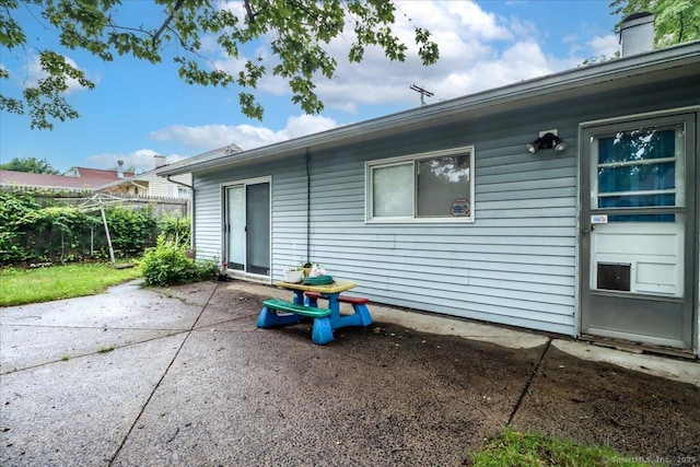 115 Sunburst Rd, Bridgeport, CT 06606 - back of property featuring a patio area