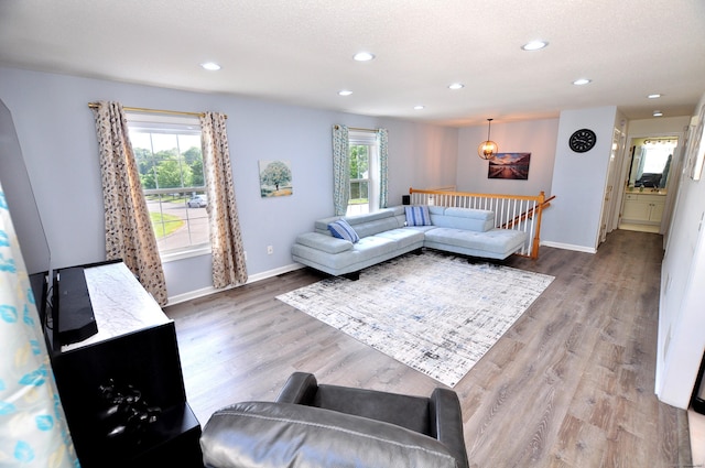 61 Windy Hill Ln Unit 61, Rocky Hill, CT 06067 - living area with plenty of natural light, baseboards, recessed lighting, and wood finished floors