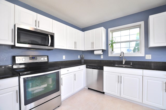 61 Windy Hill Ln Unit 61, Rocky Hill, CT 06067 - kitchen with stainless steel appliances, a sink, and white cabinets