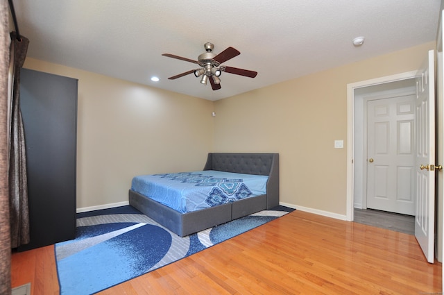 61 Windy Hill Ln Unit 61, Rocky Hill, CT 06067 - bedroom featuring wood finished floors, baseboards, recessed lighting, and ceiling fan