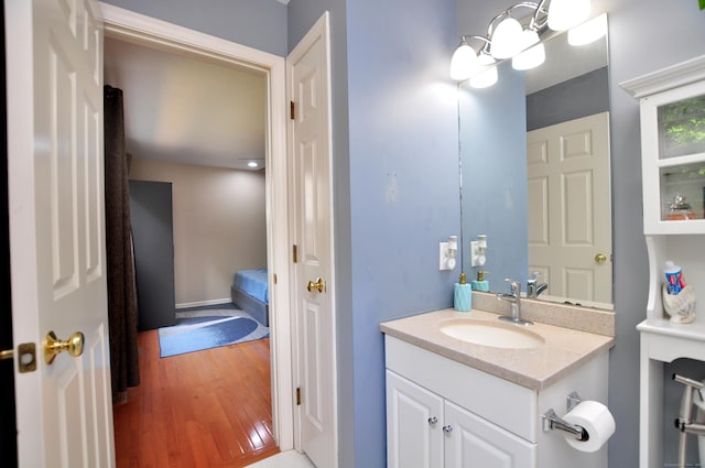 61 Windy Hill Ln Unit 61, Rocky Hill, CT 06067 - bathroom with vanity and wood finished floors