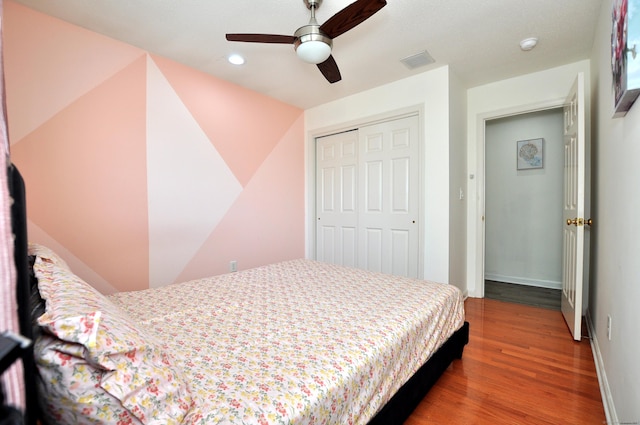 61 Windy Hill Ln Unit 61, Rocky Hill, CT 06067 - bedroom featuring wood finished floors, a closet, recessed lighting, baseboards, and ceiling fan