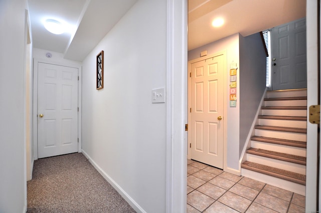 61 Windy Hill Ln Unit 61, Rocky Hill, CT 06067 - hallway with stairway, baseboards, and light tile patterned floors