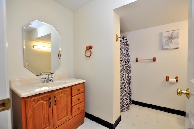61 Windy Hill Ln Unit 61, Rocky Hill, CT 06067 - full bath featuring vanity, tile patterned floors, baseboards, and a shower with shower curtain