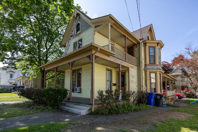 44 Albert St, Torrington, CT 06790 - view of front of house featuring covered porch, a balcony, and cooling unit