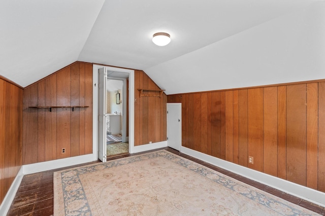 28 Wardwell Rd, West Hartford, CT 06107 - bonus room with wooden walls, lofted ceiling, wood finished floors, and baseboards