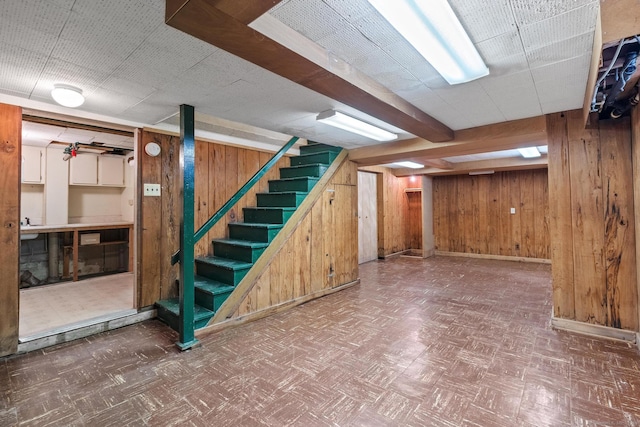 28 Wardwell Rd, West Hartford, CT 06107 - finished below grade area featuring wood walls, stairs, and baseboards