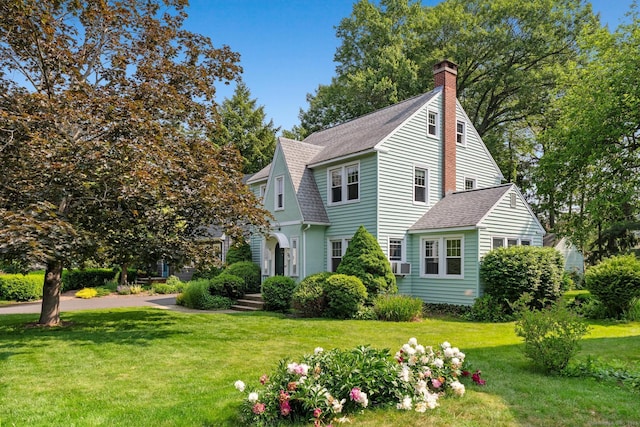 28 Wardwell Rd, West Hartford, CT 06107 - view of side of property with a lawn, roof with shingles, a chimney, and cooling unit