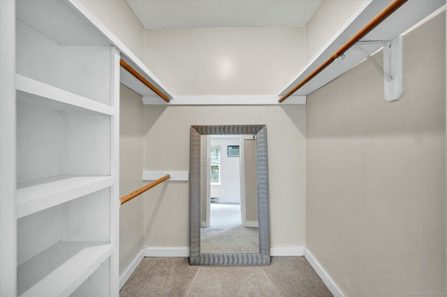 745 Merrow Rd Apt 157, Coventry, CT 06238 - walk in closet featuring light colored carpet