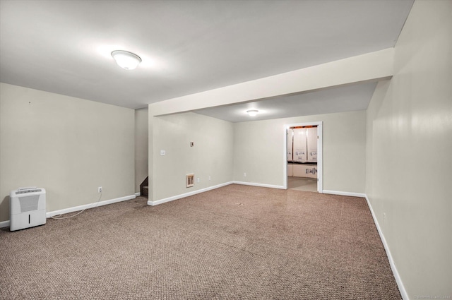 745 Merrow Rd Apt 157, Coventry, CT 06238 - finished below grade area with baseboards, carpet flooring, and stairway