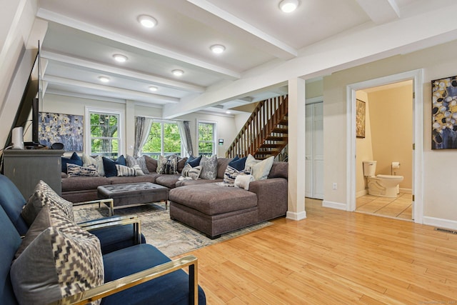 958 Essex Rd, Westbrook, CT 06498 - living area featuring stairs, wood finished floors, and beamed ceiling