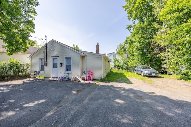 60 Albert St, Torrington, CT 06790 - bungalow-style house with a chimney and driveway