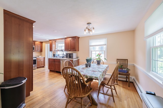 52 N Grand St, Suffield, CT 06093 - dining room featuring light wood-type flooring, a chandelier, and recessed lighting