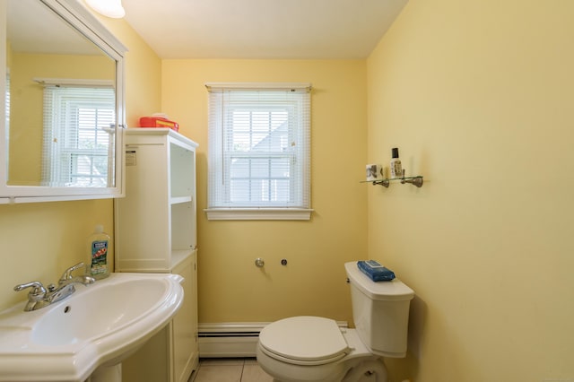 52 N Grand St, Suffield, CT 06093 - bathroom featuring a sink, healthy amount of natural light, toilet, and tile patterned floors