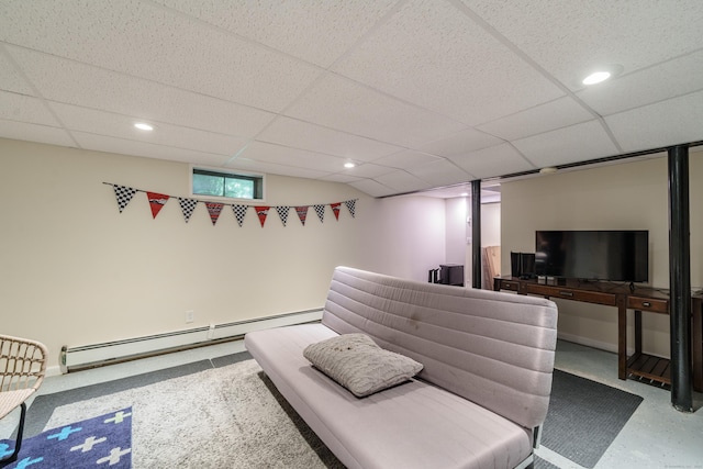 52 N Grand St, Suffield, CT 06093 - living area with baseboards, a drop ceiling, and baseboard heating
