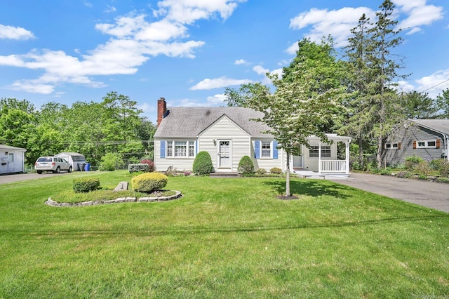 23 Charter Rd, Ellington, CT 06029 - view of front of property with a chimney and a front yard