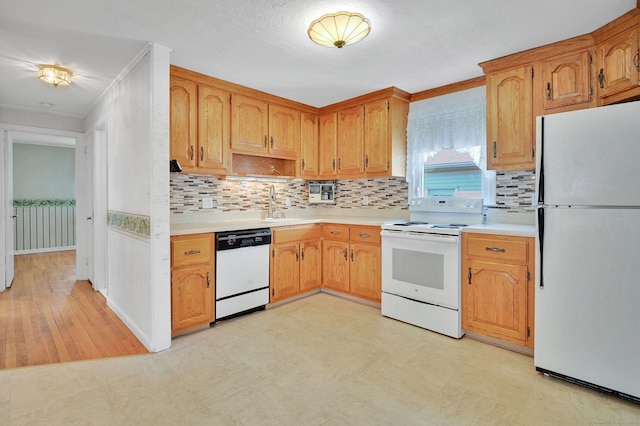 23 Charter Rd, Ellington, CT 06029 - kitchen featuring white appliances, light countertops, decorative backsplash, ornamental molding, and a sink