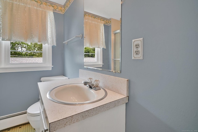 23 Charter Rd, Ellington, CT 06029 - bathroom featuring baseboard heating, toilet, and vanity