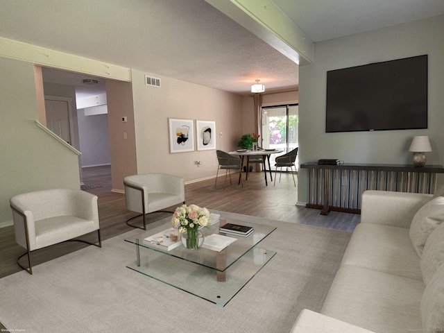 8 Highpoint Ct Unit 8, Woodbury, CT 06798 - living area featuring wood finished floors and baseboards