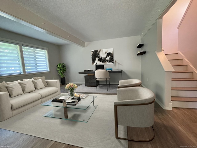8 Highpoint Ct Unit 8, Woodbury, CT 06798 - living room with wood finished floors, stairway, baseboards, a textured ceiling, and beam ceiling