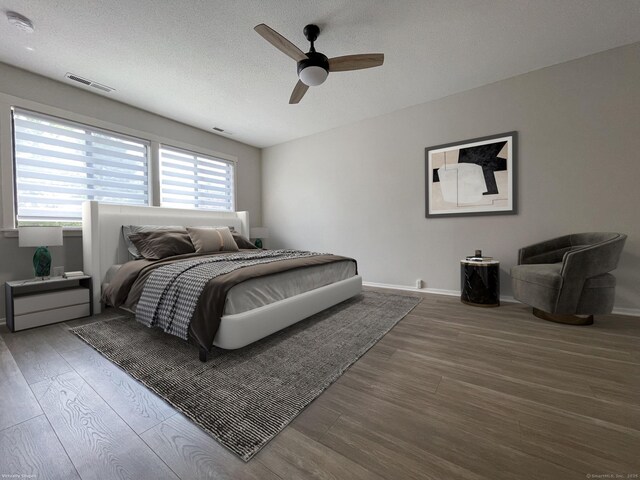 8 Highpoint Ct Unit 8, Woodbury, CT 06798 - bedroom featuring wood finished floors, baseboards, ceiling fan, and a textured ceiling