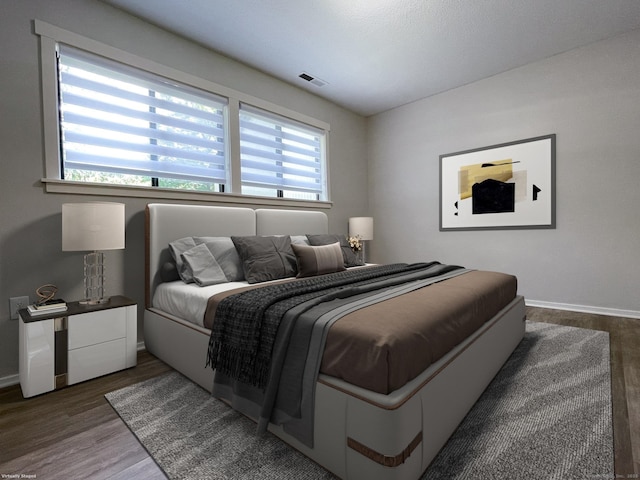 8 Highpoint Ct Unit 8, Woodbury, CT 06798 - bedroom with multiple windows, baseboards, and wood finished floors