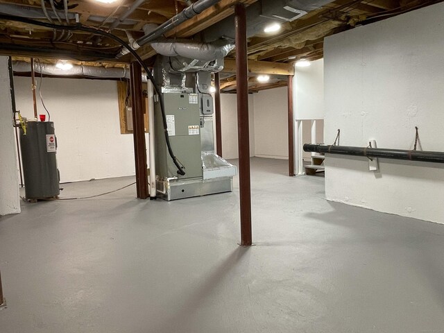 8 Highpoint Ct Unit 8, Woodbury, CT 06798 - unfinished basement with electric water heater and heating unit