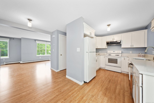 30 Seymour Rd Apt D3, Plymouth, CT 06786 - kitchen featuring white appliances, light countertops, light wood-style floors, and open floor plan