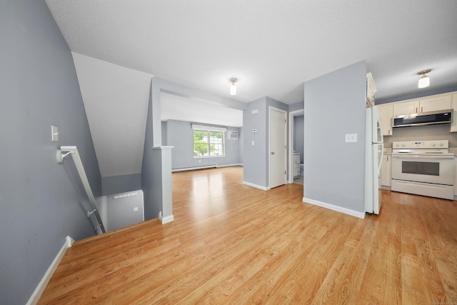 30 Seymour Rd Apt D3, Plymouth, CT 06786 - kitchen featuring white appliances, white cabinetry, baseboard heating, light wood finished floors, and open floor plan