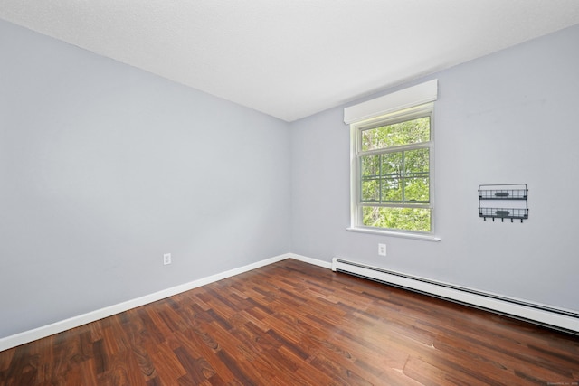 30 Seymour Rd Apt D3, Plymouth, CT 06786 - empty room featuring baseboard heating and wood finished floors