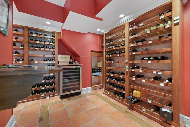 66 Stanton Rd, Darien, CT 06820 - wine cellar with wine cooler, a bar, recessed lighting, and inlaid floor details