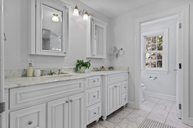 66 Stanton Rd, Darien, CT 06820 - bathroom with marble finish flooring and double vanity