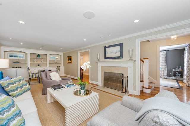 3 Bittersweet Trl, Norwalk, CT 06853 - living room featuring ornamental molding, a fireplace, baseboards, recessed lighting, and stairs