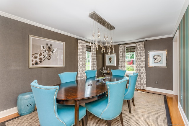 3 Bittersweet Trl, Norwalk, CT 06853 - dining area with wood finished floors, a chandelier, baseboards, and crown molding