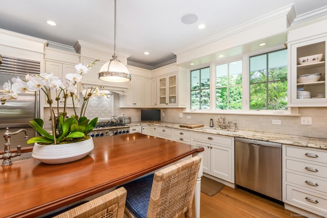 3 Bittersweet Trl, Norwalk, CT 06853 - kitchen with dishwasher, a sink, tasteful backsplash, glass insert cabinets, and crown molding