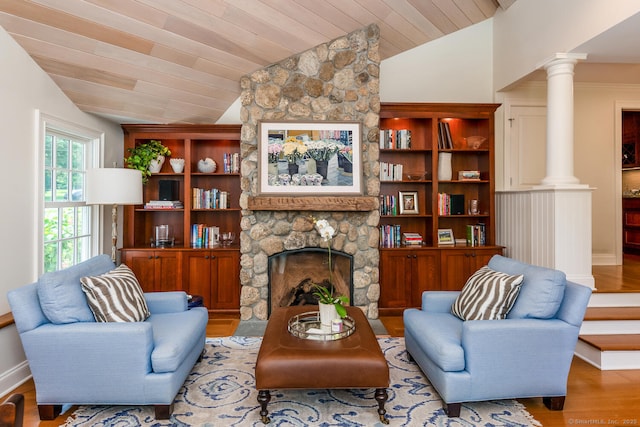 3 Bittersweet Trl, Norwalk, CT 06853 - living room with lofted ceiling, wood finished floors, decorative columns, a fireplace, and wood ceiling