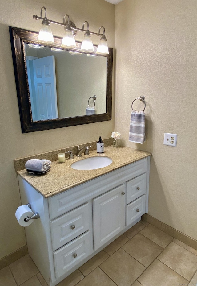 64 Copper Beech Dr Unit 64, Rocky Hill, CT 06067 - bathroom with vanity, tile patterned flooring, and baseboards