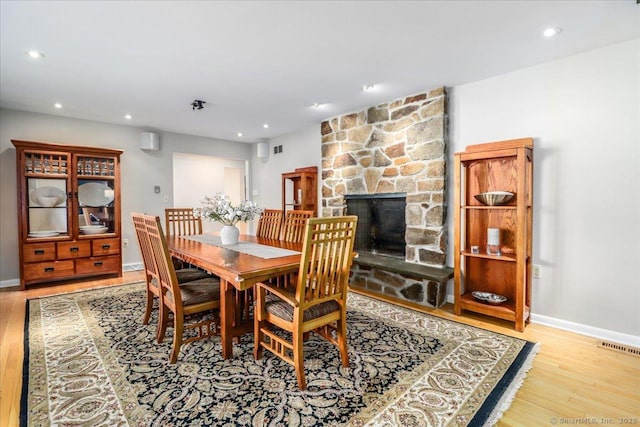 10 Fernbrook Dr, Brookfield, CT 06804 - dining room with wood finished floors, recessed lighting, and a fireplace
