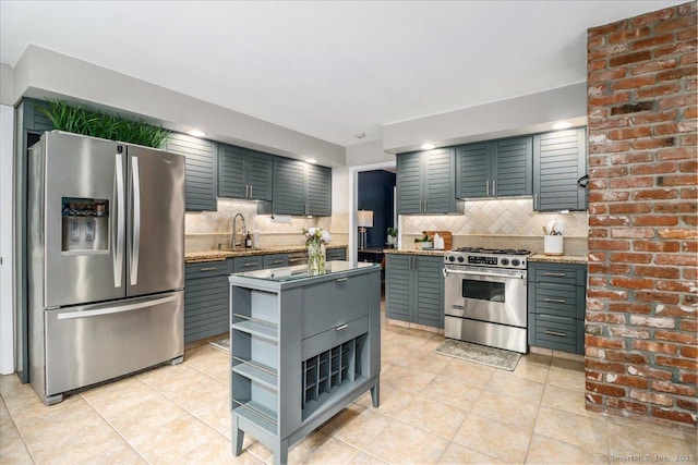 10 Fernbrook Dr, Brookfield, CT 06804 - kitchen featuring appliances with stainless steel finishes, backsplash, light tile patterned flooring, and a center island