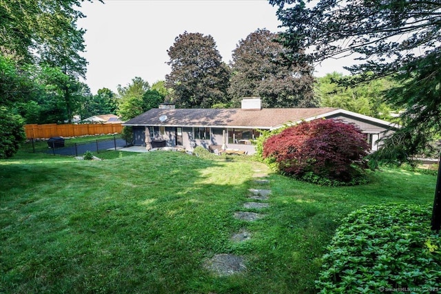 10 Fernbrook Dr, Brookfield, CT 06804 - back of house featuring a chimney