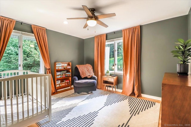 10 Fernbrook Dr, Brookfield, CT 06804 - bedroom with multiple windows, a ceiling fan, a nursery area, and recessed lighting