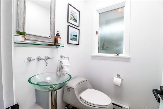 10 Fernbrook Dr, Brookfield, CT 06804 - half bathroom with a baseboard radiator and toilet