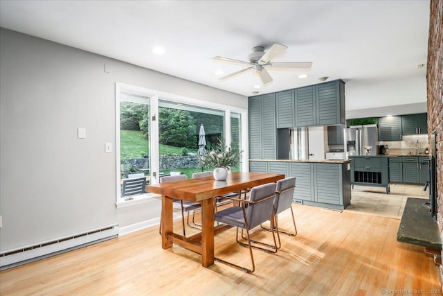 10 Fernbrook Dr, Brookfield, CT 06804 - dining room featuring baseboard heating, a ceiling fan, light wood-type flooring, and recessed lighting