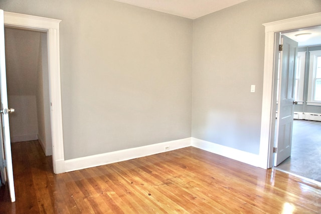 10 Fleming St, Waterbury, CT 06710 - empty room with baseboards and light wood-style flooring