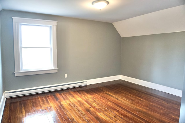 10 Fleming St, Waterbury, CT 06710 - additional living space featuring a baseboard radiator, healthy amount of natural light, vaulted ceiling, dark wood-style flooring, and baseboards