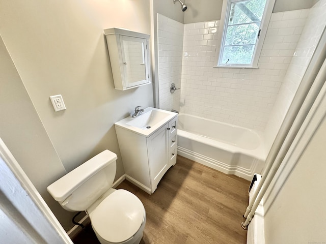 10 Fleming St, Waterbury, CT 06710 - full bath with toilet, wood finished floors, vanity, and shower / washtub combination